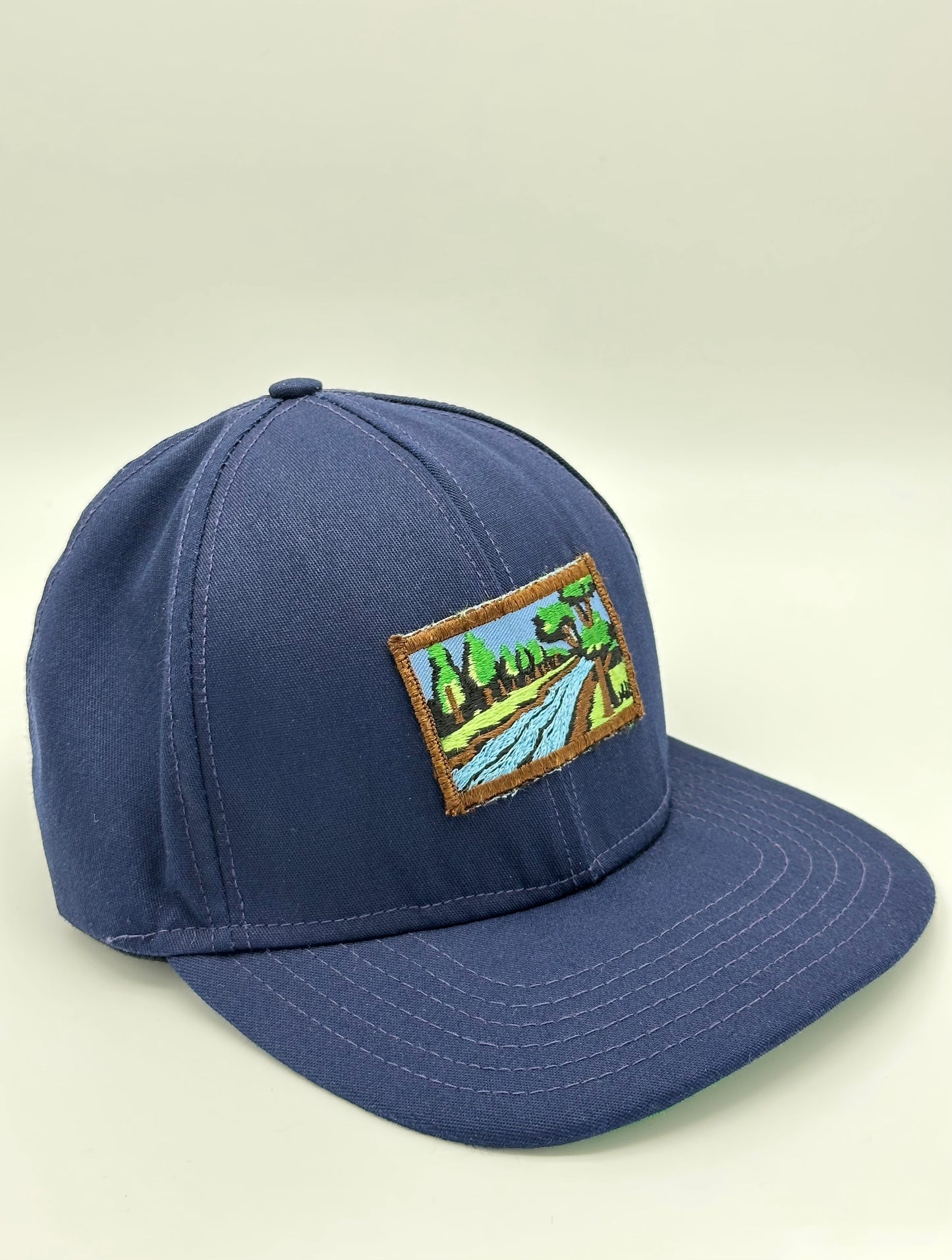 Portal Cap with River View